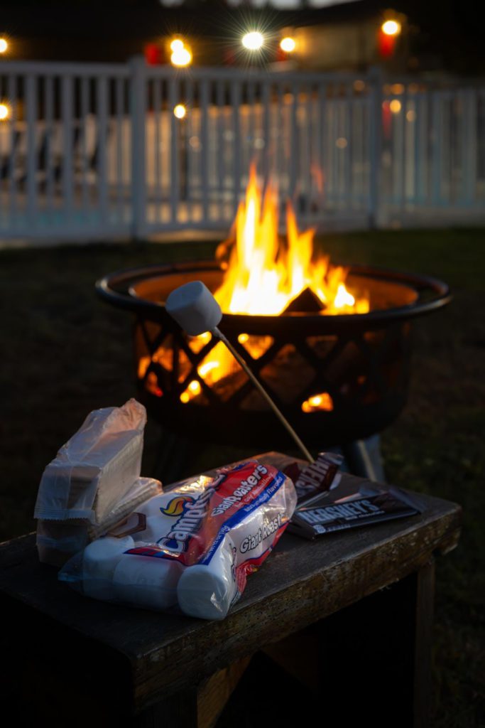A fire pit on a wooden table.